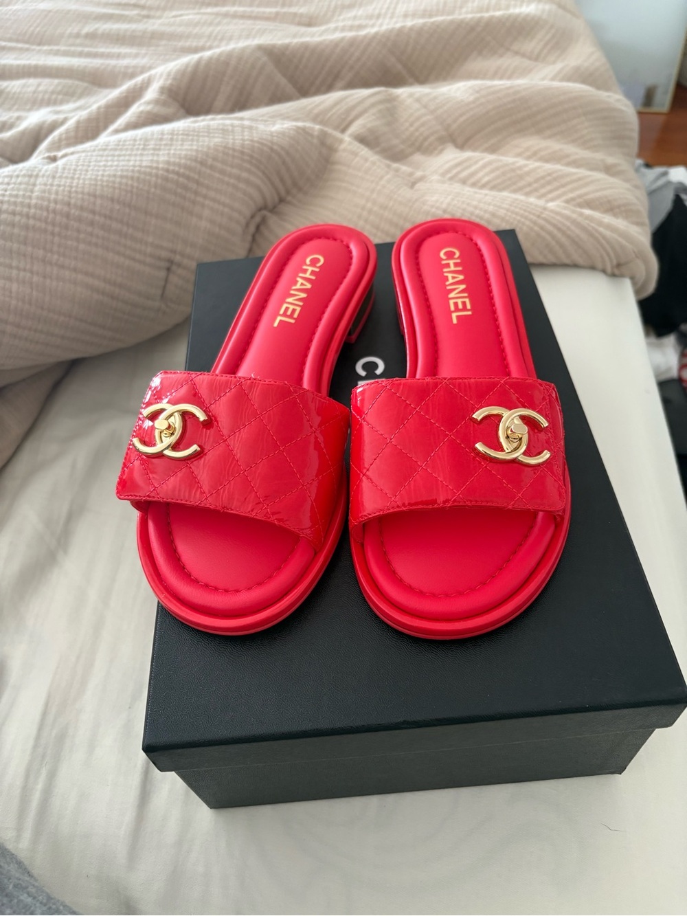 CHANEL Red Quilted Slide Mules with Gold CC Hardware
